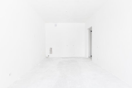 interior of the apartment without decoration in gray colors. rough finishの写真素材