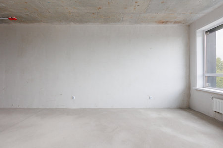 interior of the apartment without decoration in gray colors. rough finish