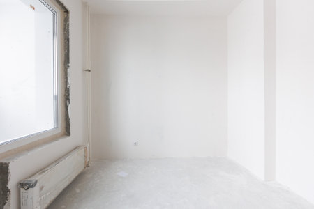 interior of the apartment without decoration in gray colors. rough finishの写真素材