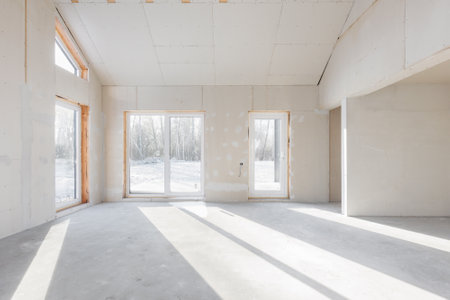 interior of the apartment without decoration in gray colors. rough finishの写真素材