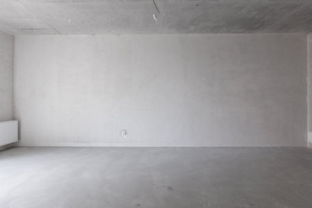 interior of the apartment without decoration in gray colors. rough finishの写真素材