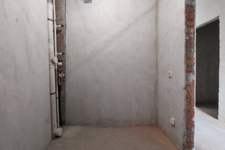 interior of the apartment without decoration in gray colors. rough finishの写真素材