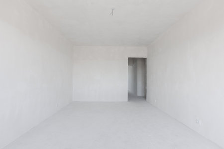 interior of the apartment without decoration in gray colors. rough finishの写真素材