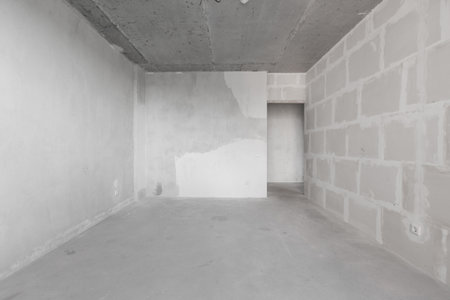 interior of the apartment without decoration in gray colors. rough finish