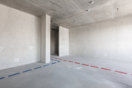 interior of the apartment without decoration in gray colors. rough finishの写真素材