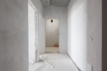 interior of the apartment without decoration in gray colors. rough finishの写真素材
