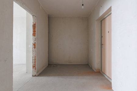 interior of the apartment without decoration in gray colors. rough finishの写真素材