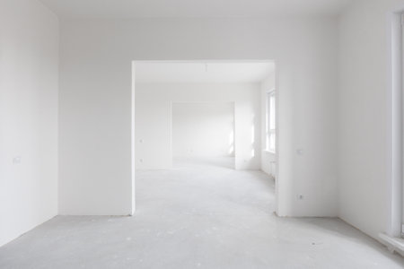 interior of the apartment without decoration in gray colors. rough finishの写真素材