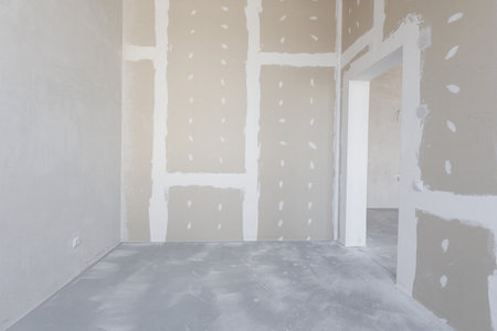 interior of the apartment without decoration in gray colors. rough finishの写真素材