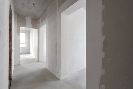 interior of the apartment without decoration in gray colors. rough finishの写真素材