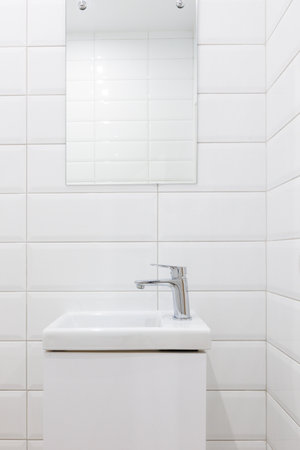 modern bathroom room with toilet and washing machineの写真素材