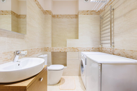 modern bathroom room with toilet and washing machineの写真素材