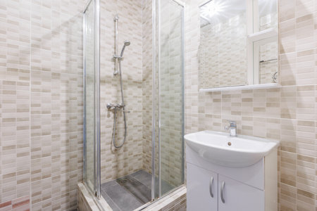 modern bathroom room with toilet and washing machine