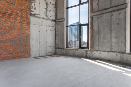 interior of the apartment without decoration in gray colors. rough finish