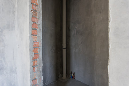 interior of the apartment without decoration in gray colors. rough finish