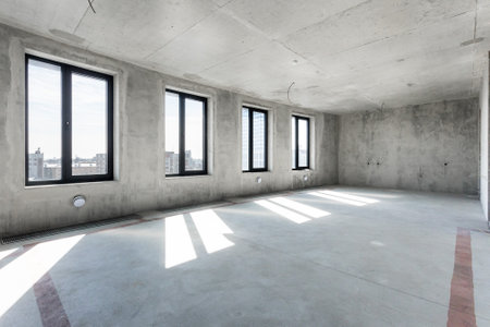 interior of the apartment without decoration in gray colors. rough finishの写真素材