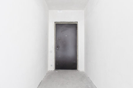 interior of the apartment without decoration in gray colors. rough finishの写真素材