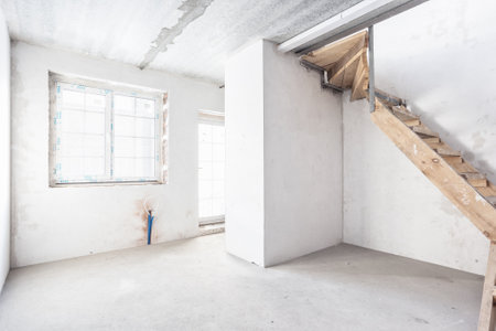 interior of the apartment without decoration in gray colors. rough finishの写真素材