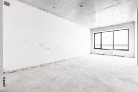 interior of the apartment without decoration in gray colors. rough finishの写真素材