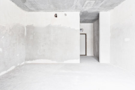 interior of the apartment without decoration in gray colors. rough finishの写真素材