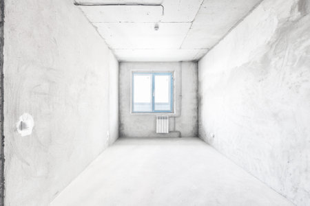 interior of the apartment without decoration in gray colors. rough finishの写真素材
