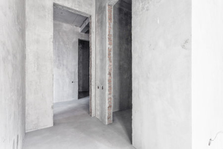 interior of the apartment without decoration in gray colors. rough finishの写真素材