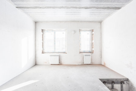 interior of the apartment without decoration in gray colors. rough finishの写真素材