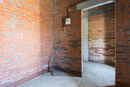 interior of the apartment without decoration in gray colors. rough finishの写真素材