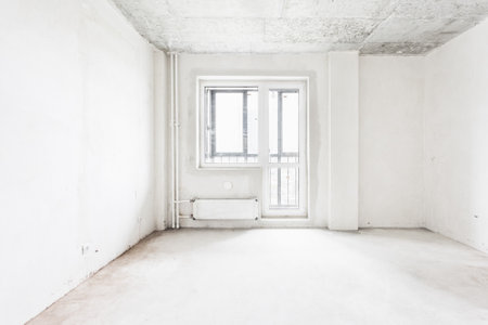 interior of the apartment without decoration in gray colors. rough finishの写真素材