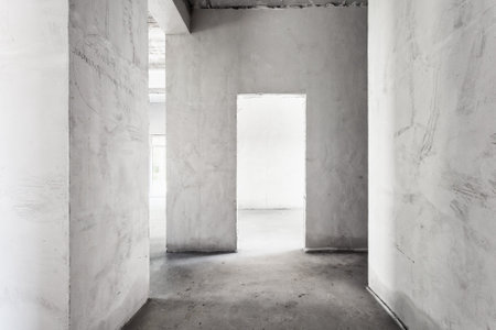 interior of the apartment without decoration in gray colors. rough finishの写真素材