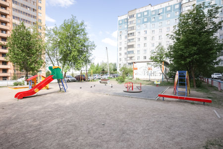 children's playground on the territory of an apartment buildingの写真素材