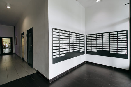 mailboxes in the lobby of an apartment building