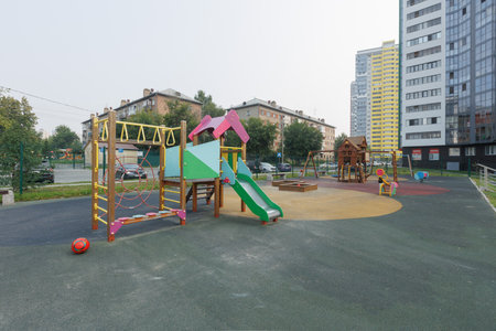 children's playground on the territory of an apartment buildingの写真素材