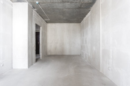 interior of the apartment without decoration in gray colors. rough finish