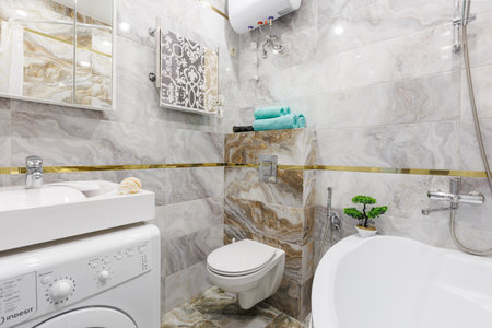 modern bathroom room with toilet and washing machineの写真素材