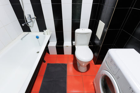 modern bathroom room with toilet and washing machineの写真素材