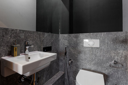 modern bathroom room with toilet and washing machineの写真素材