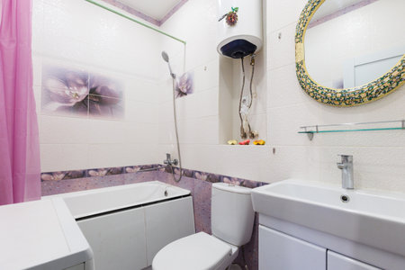 modern bathroom room with toilet and washing machine