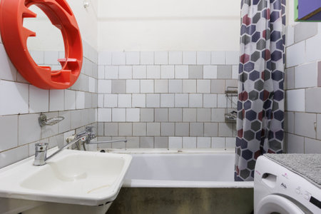 modern bathroom room with toilet and washing machineの写真素材