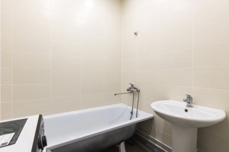 modern bathroom room with toilet and washing machineの写真素材
