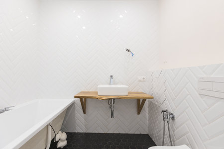 modern bathroom room with toilet and washing machineの写真素材