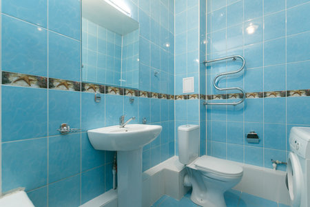 modern bathroom room with toilet and washing machineの写真素材