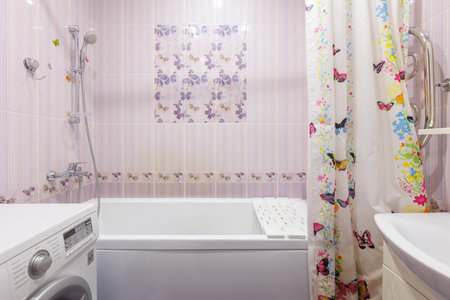 modern bathroom room with toilet and washing machineの写真素材