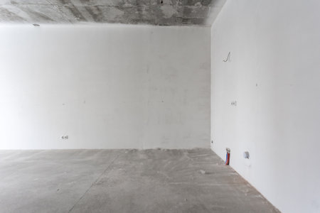 interior of the apartment without decoration in gray colors. rough finishの写真素材