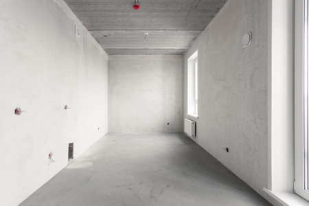 interior of the apartment without decoration in gray colors. rough finishの写真素材
