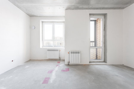 interior of the apartment without decoration in gray colors. rough finishの写真素材