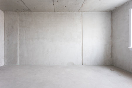 interior of the apartment without decoration in gray colors. rough finishの写真素材