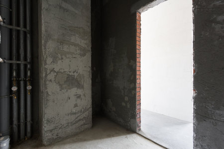 interior of the apartment without decoration in gray colors. rough finishの写真素材