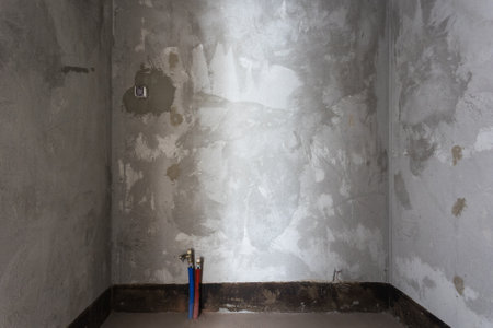 interior of the apartment without decoration in gray colors. rough finishの写真素材