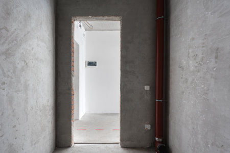 interior of the apartment without decoration in gray colors. rough finishの写真素材